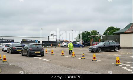 McDonalds Drive Thru, 2 Linkwood Place, Elgin, Moray, UK. 2nd June, 2020. UK, IV30 1HZ. This is some of the first customers at the vey well organised McDonalds in Elgin. Ques did form however, Police No waiting Cones had been placed to secure spaces for que. Credit: JASPERIMAGE/Alamy Live News Stock Photo