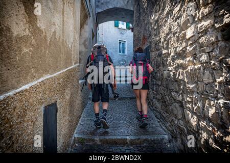 Walking in a village of Lake Como during a visit Stock Photo