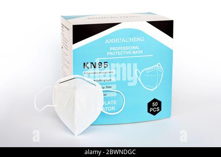 KN95 professional white medical protective face mask box package, studio product shot. Anti viral safety masks with filter, metal nose piece Stock Photo