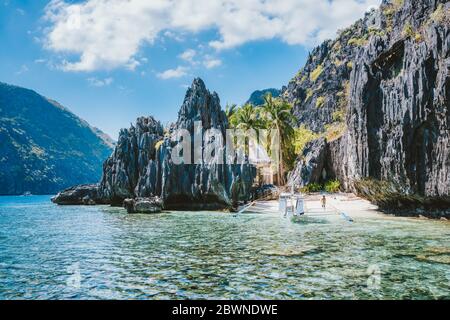 El Nido Palawan Philippines Asia. Banca boat at a small beach near the Matinloc Shrine. Trip highlights of Tour C Stock Photo