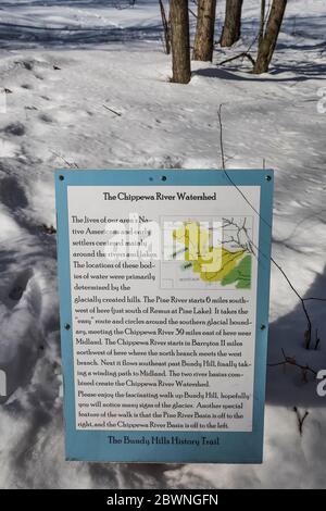 Signs interpreting the history of people and land at the Bundy Hill nature preserve in Isabella Country, Michigan, USA [No property release; available Stock Photo