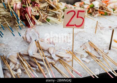 Frog skewers street food with price tag in Kuala Lumpur, Malaysia. Stock Photo