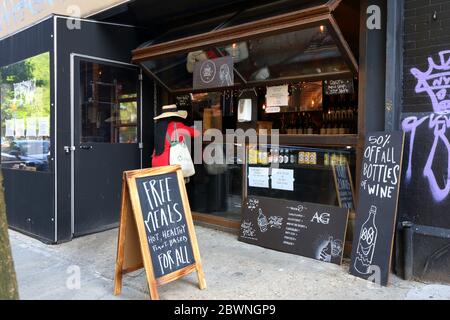 Avant Garden in the East Village neighborhood of New York offering free vegan meals during the Covid crisis. may 24, 2020. Stock Photo