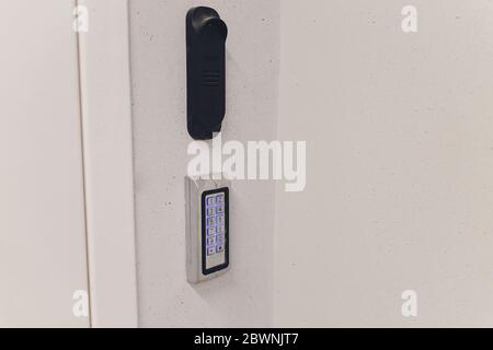 Secure password on keyboard for opening home house door. Password code Security keypad system protected in Public Building. The security code combinat Stock Photo