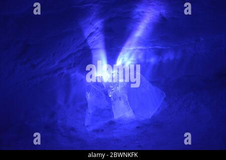 Expoloding Ice Chunks A small light source causes exploding purple rays to spread out from ...