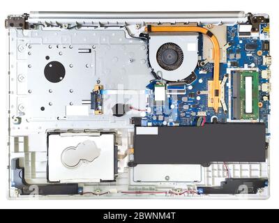 Part of laptop above view. Exploded view computer. Mother board, cooler and hard drive Stock Photo