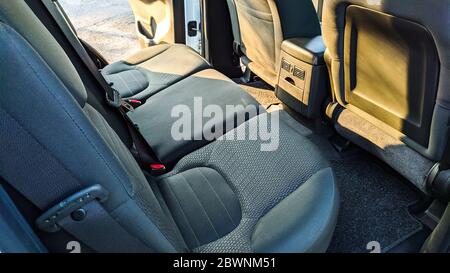 Car interior inside is empty. Rear seat view for passengers. Stock Photo