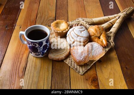 concha mexican bread and coffee cup is a breakfast in mexico city