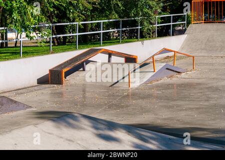 Area for roller skating, skateboards, scooters. Skate park. Stock Photo