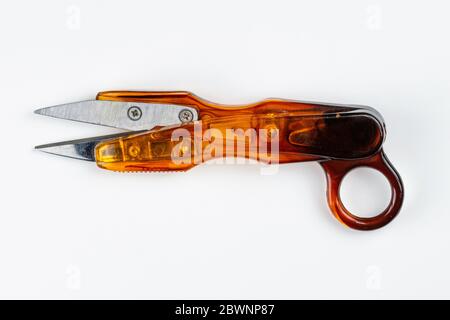 old plastic scissors from the tailor shop Stock Photo