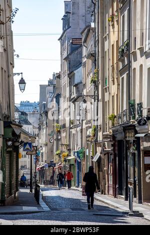 Paris, France - April 1, 2020: 17th day of containment because of Covid-19 in Mouffetard street in Paris Stock Photo