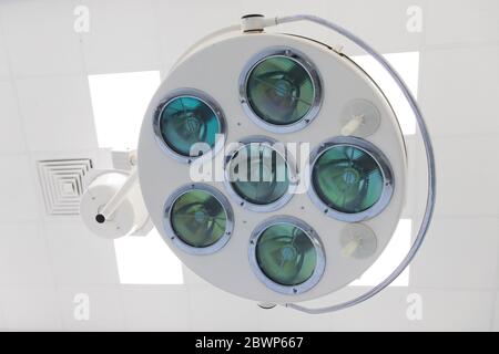 Closeup of modern medical/surgical lamp in operation room in the clinic, bottom view Stock Photo
