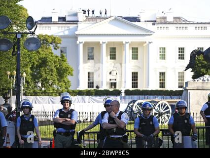 Washington, United States. 02nd June, 2020. U.S. Park Police stand guard in front of the White House during a demonstration against the Minnesota police killing of George Floyd, on Tuesday, June 2, 2020 in Washington, DC Activists nationwide defied curfews in some of the larger cities late Monday and early Tuesday, just hours after President Donald Trump threatened to send the U.S. military into cities that don't control the violent demonstrations. Photo by Tasos Katopodis/UPI Credit: UPI/Alamy Live News Stock Photo