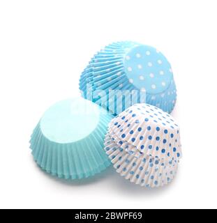 Muffin baking cups on white background Stock Photo