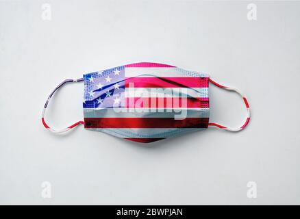 Photograph of protective mask with the American flag design on a white background Stock Photo