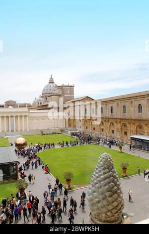 Vatican City, Vatican - May 20, 2019: Courtyard of the Pine Cone (Cortile della Pigna) through a window from the Vatican Museum Stock Photo