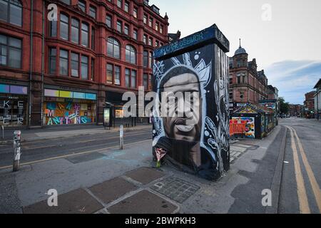 Manchester, UK. 02nd June, 2020. A freshly painted mural of the late George Floyd, has been created by the artist AKSE in Stevenson square, Manchester.A mural of the late George Floyd, created in Manchester city centre. Credit: SOPA Images Limited/Alamy Live News Stock Photo