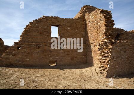 NM00394-00...NEW MEXICO - Walls with doors and log supports for floors in a multi-storied building at Pueblo del Arroyo in Chaco Culture National Park Stock Photo