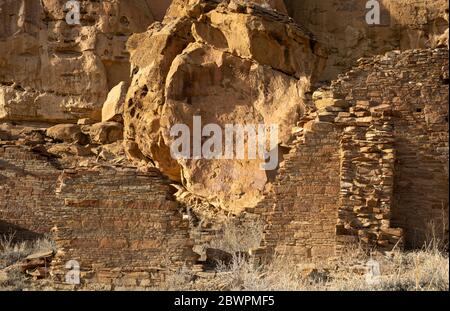 The sandstone walls of the Anasazi great house of Kin Kletso, in Chaco ...