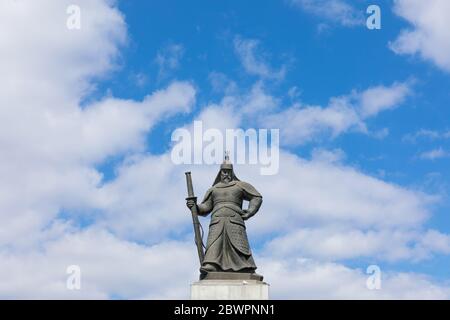 Gwanghwamun Square, Seoul, South Korea - February 27, 2020: Admiral Yi Sun-shin statue with blue sky and clouds background Stock Photo