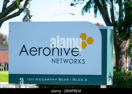 Aerohive Networks sign at computer networking equipment company headquarters - Milpitas, California, USA - 2020 Stock Photo