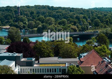 Potsdam, Germany. 02nd June, 2020. Residential and commercial buildings near the bridge of the Nuthestraße leading over the Havel or Tiefer See (l) as federal road 1. In the background the Park Babelsberg with the Flatow Tower. Credit: Soeren Stache/dpa-Zentralbild/ZB/dpa/Alamy Live News Stock Photo