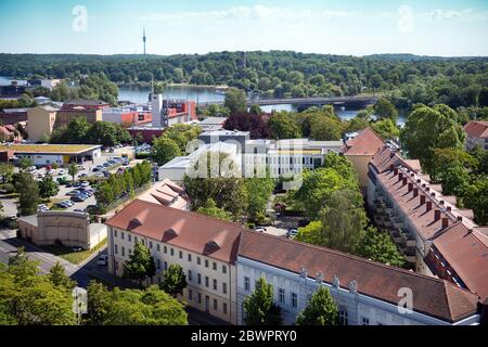 Potsdam, Germany. 02nd June, 2020. Residential and commercial buildings near the bridge of the Nuthestraße leading over the Havel or Tiefer See (l) as Bundesstraße 1. in the foreground the square of the houses Berliner Straße/Am Kanal, in the background the Park Babelsberg with the Flatowturm (M) and the Fernmeldeurm Schäferberg in Berlin, district Wannsee Credit: Soeren Stache/dpa-Zentralbild/ZB/dpa/Alamy Live News Stock Photo