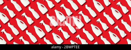 Plastic bottles pattern of cleaning products on red background. Plastic waste. Detergent bottle pattern. Chemical cleaning supplies. Stop plastic, rec Stock Photo