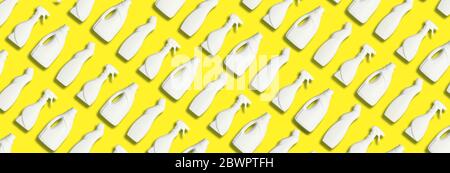 Plastic bottles pattern of cleaning products on yellow background. Plastic waste. Detergent bottle pattern. Chemical cleaning supplies. Stop plastic, Stock Photo