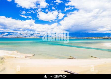 Aerial view of beautiful lagoon near town of Nin in Dalmatia, Croatia. Adriatic coastline and turquoise water and blue sky with clouds Stock Photo