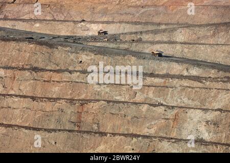 Kalgoorlie Western Australia November 14th 2019 : Trucks working in the Super Pit, a gold mine in Kalgoorlie, Western Australia Stock Photo