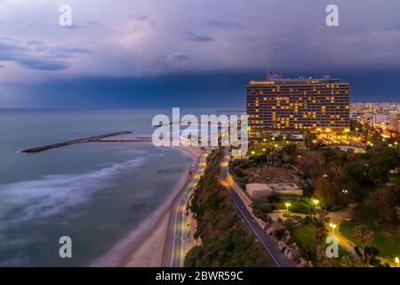 Elevated view of the beaches and hotels at dusk, Tel Aviv, Israel, Middle East Stock Photo