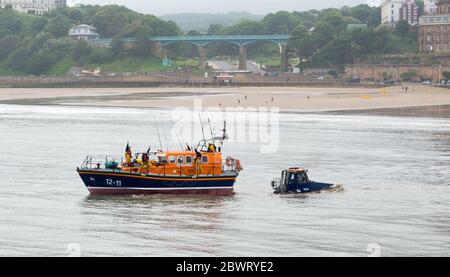 the Mersey Class RNLI all weather lifeboat being launched from  the beach at Scarborough on the North Yorkshire coast Stock Photo