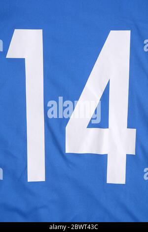 blue football shirt with white number 14 on it. sports wear background  Stock Photo - Alamy