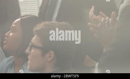 close up. business colleagues applaud standing in the office Stock Photo