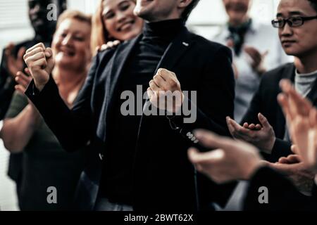 close up. happy group of diverse business people standing together. Stock Photo