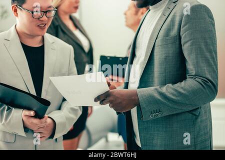 close up. business partners discussing a business documen Stock Photo