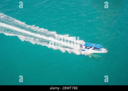 Aerial view of small boat flowing in sea, travel and vacation concept Stock Photo