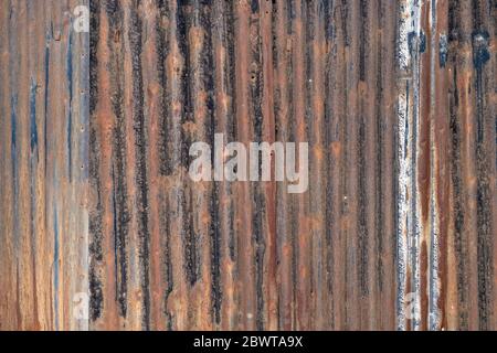 Rusty galvanized wall texture background. Metal panel sheeting. Stock Photo