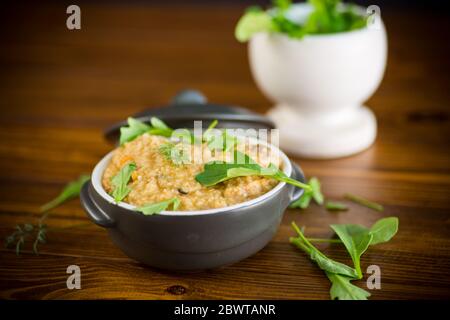 boiled bulgur groats with vegetables and herbs Stock Photo