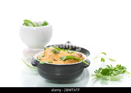 boiled bulgur groats with vegetables and herbs Stock Photo