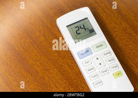 Air conditioner remote control with LCD display. Stock Photo