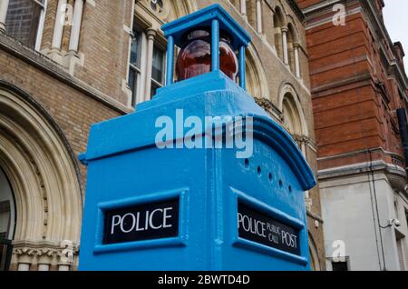 London, UK: Dec 2, 2017: Detail view of a Police Public Call Post, small cast-iron towers manufactured in the late 1920’s and sited through City of Lo Stock Photo
