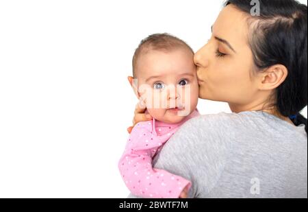 picture of happy mother with adorable baby (Focus on child) Stock Photo