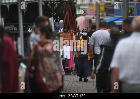 Stalls reopen at Walthamstow Market in east London, the longest street market in Europe, following the introduction of measures to bring England out of lockdown. Stock Photo