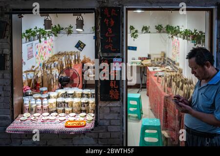 Chongqing, China -  August 2019 :  Condiment, pickle and spices seller in Ci Qi Kou Old town Stock Photo