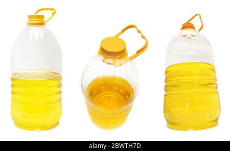 Vegetable oil in large plastic bottles of different angles isolated on white background Stock Photo