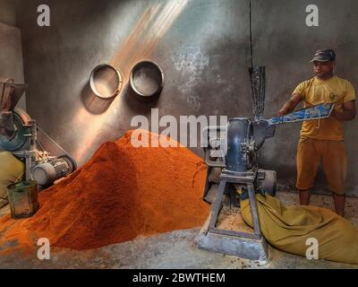 Kathmandu, Nepal. 3rd June, 2020. A man prepares turmeric powder at a mill during nationwide lockdown amid COVID-19 outbreak in Kathmandu, capital of Nepal on June 3, 2020. Credit: Sunil Sharma/ZUMA Wire/Alamy Live News Stock Photo