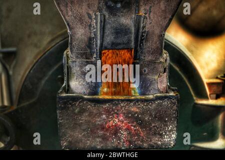 Kathmandu, Nepal. 3rd June, 2020. Turmeric powder is pictured as it come out from a grinding machine at a mill during nationwide lockdown amid COVID-19 outbreak in Kathmandu, capital of Nepal on June 3, 2020. Credit: Sunil Sharma/ZUMA Wire/Alamy Live News Stock Photo