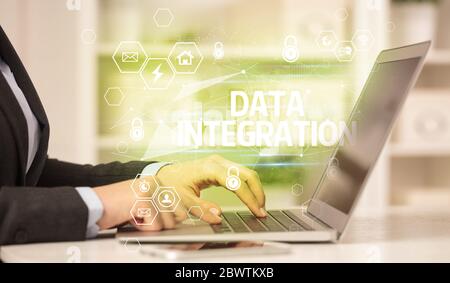 DATA INTEGRATION inscription on laptop, internet security and data protection concept, blockchain and cybersecurity Stock Photo